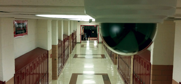 Security camera in school hallway