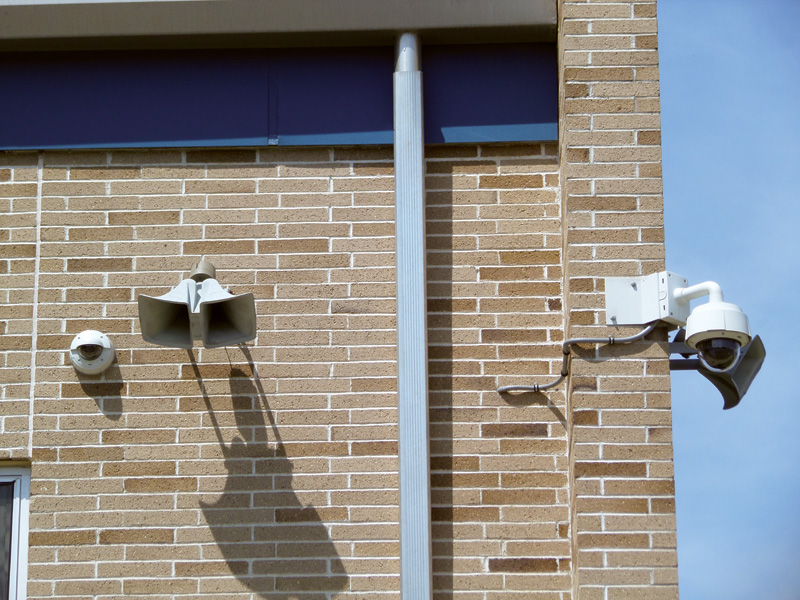 Security cameras on building exterior