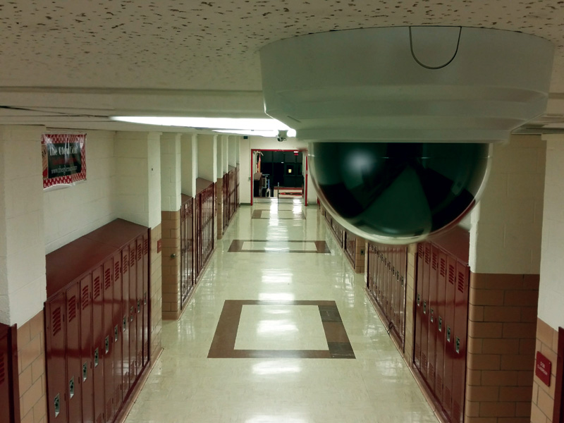 Security camera in school hallway